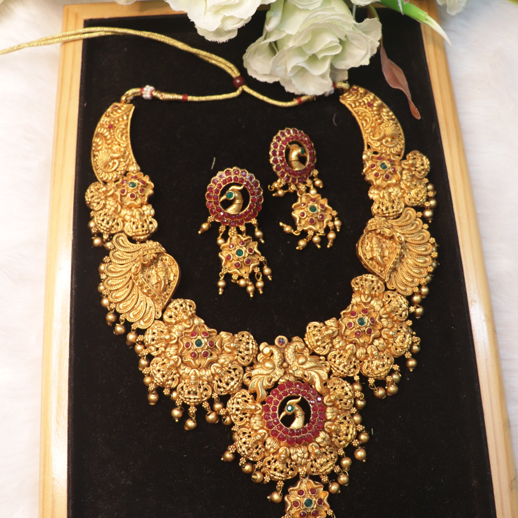 Divine Grandeur Lakshmi & Peacock Matte Haram Set