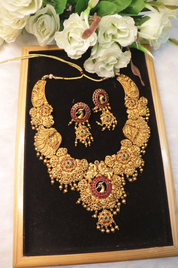 Divine Grandeur Lakshmi & Peacock Matte Haram Set