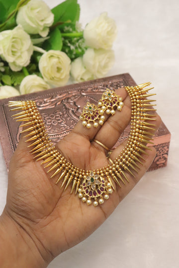 Regal Mullamottu AD Chandbali Necklace Set