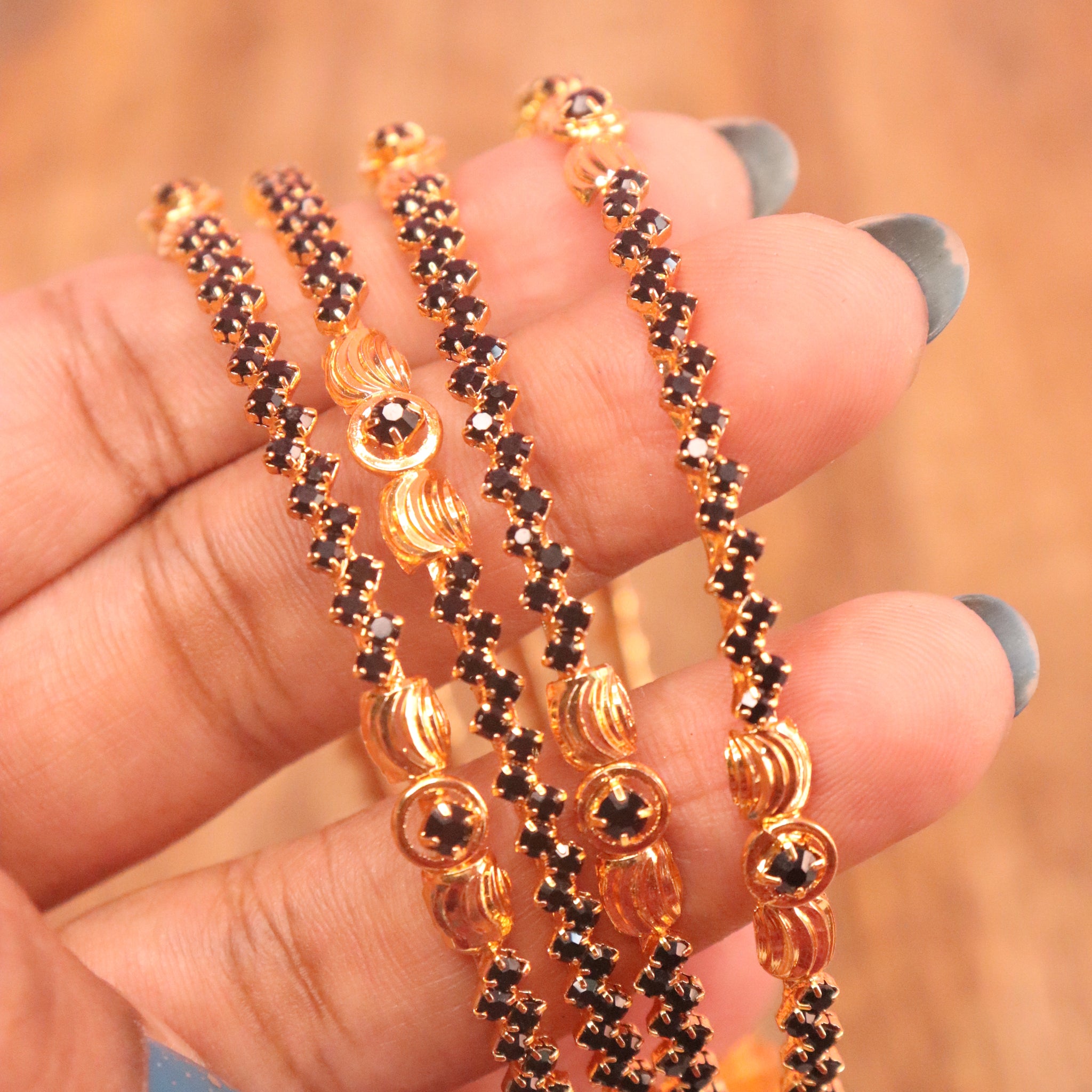 Microplated Gold Bangles with Black AD Stones