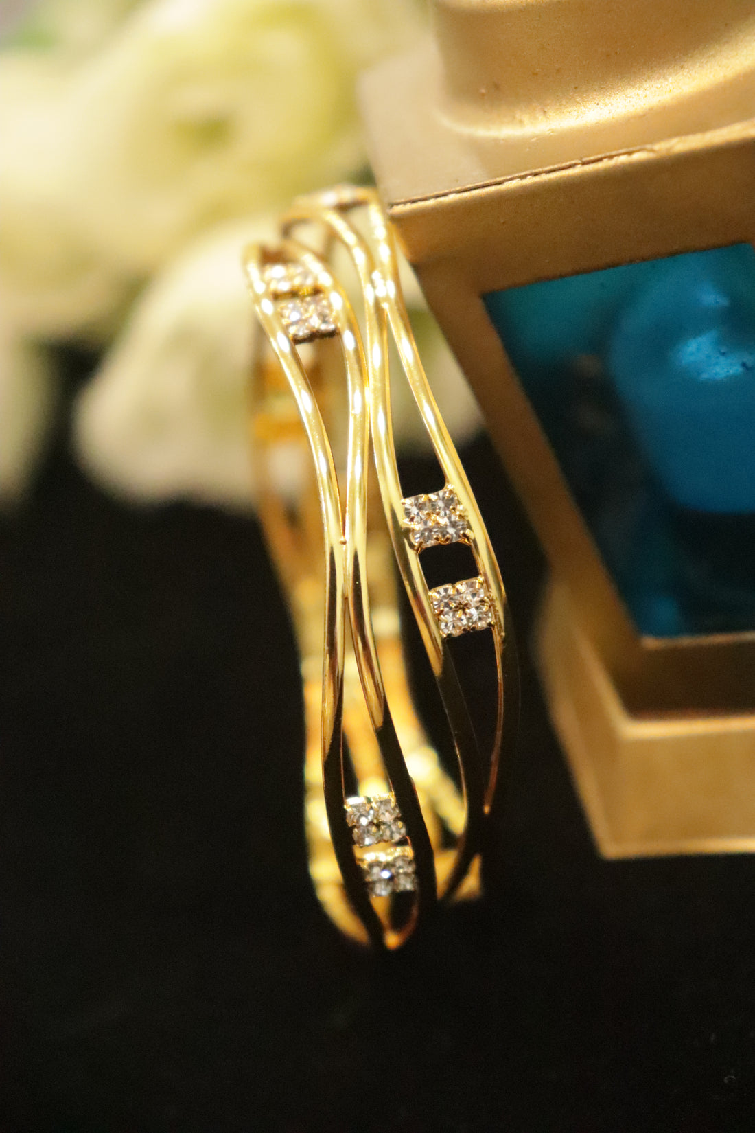 Twisted Elegance AD Microplated Bangles