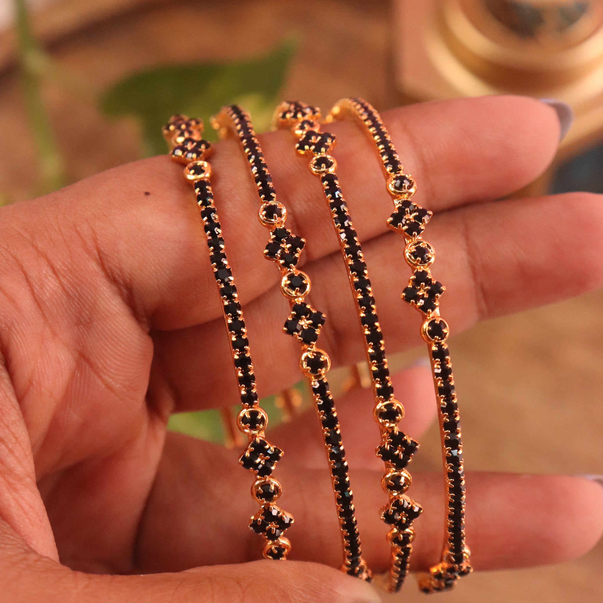 Elegant Black Stone Microplated Bangles – Set of 4