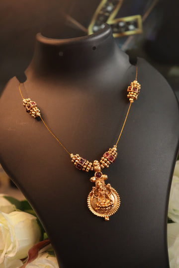 Divine Lakshmi Invisible Necklace with Traditional Pendant