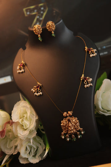 Divine Lakshmi Pendant Invisible Chain with Matching Studs – 18 Inches