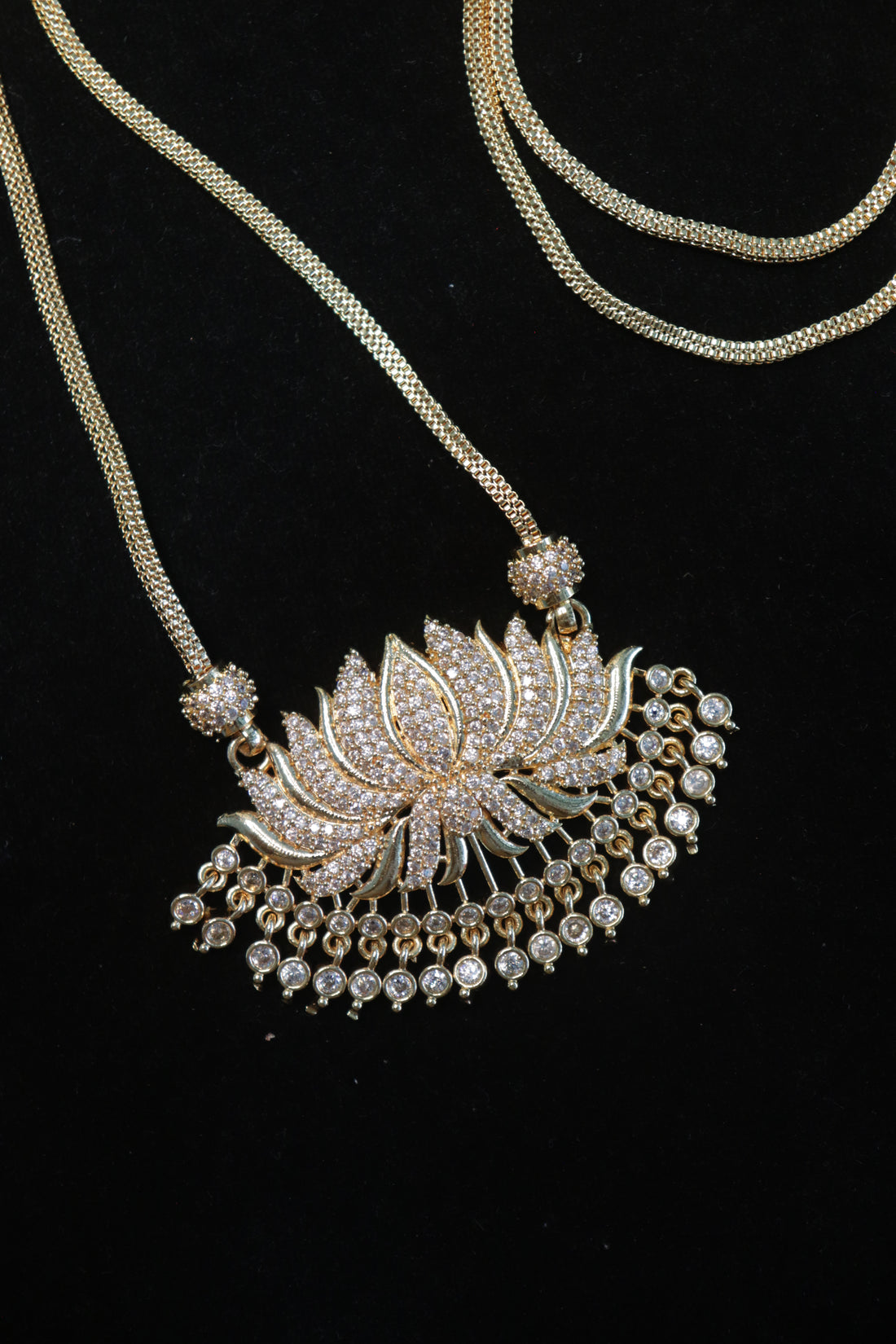 Elegant Lotus AD Stone Pendant with Microplated Dollar Chain – 24 Inches