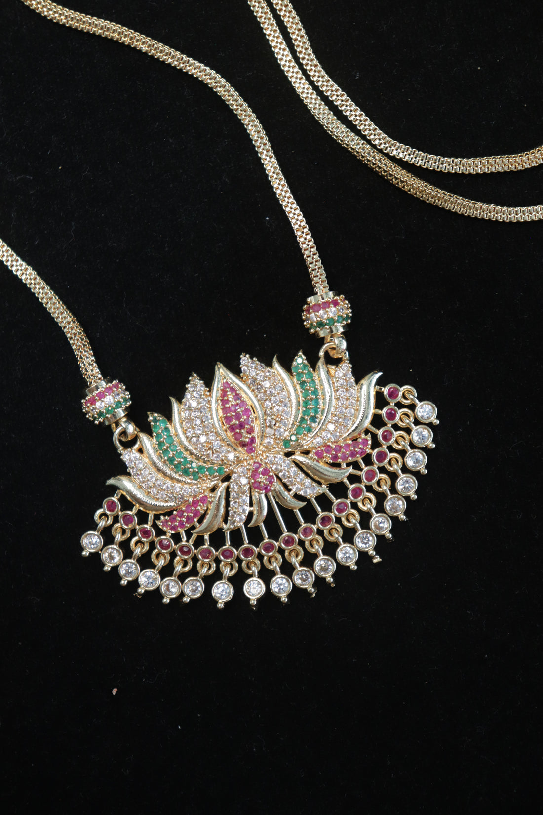 Elegant Multicolor Lotus AD Stone Pendant with Microplated Dollar Chain – 24 Inches